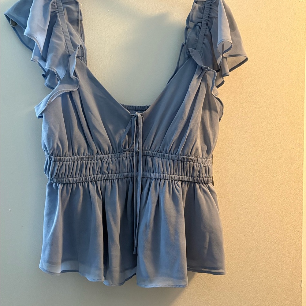 Blue Flutter Sleeve Blouse with Ruffled Tie Front